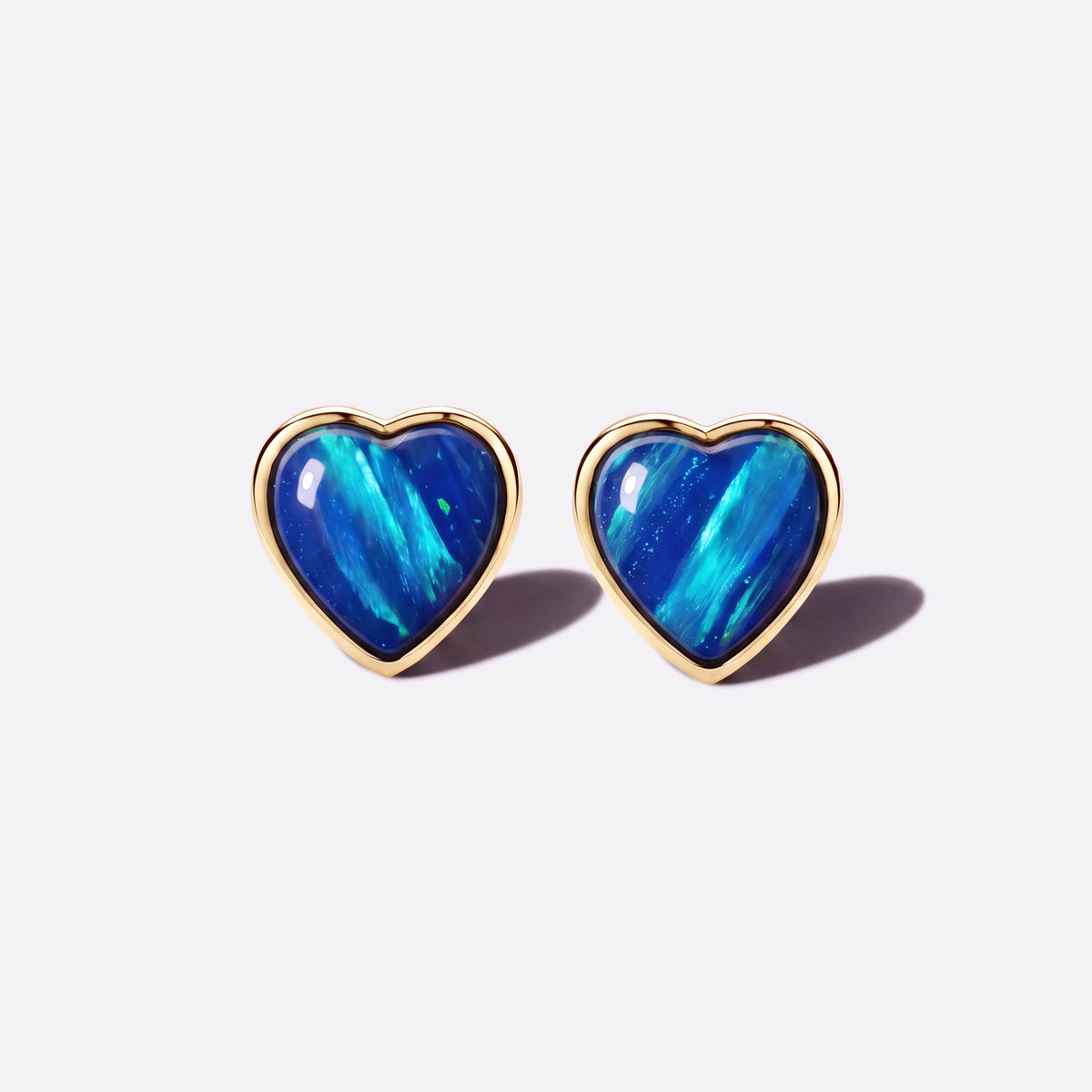 Heart of Fire Ohrstecker vergoldet mit blauer Opal-Triplette in Herzform